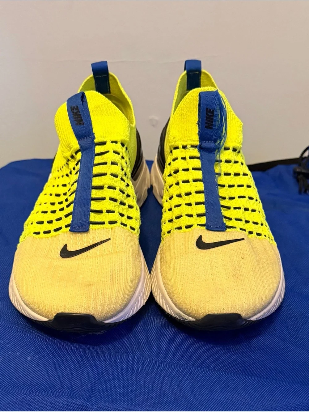 Nike mens Yellow Slip-On Sneakers with Blue Pull Tabs